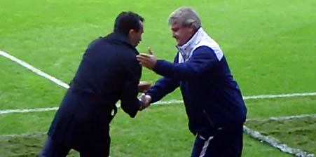 Steve Bruce and Roberto Martinez shake hands