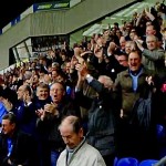 Wigan fans celebrate beating Arsenal
