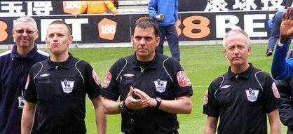 Phil Dowd and his fellow officials