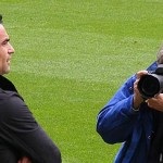 Roberto Martinez is snapped by a photographer