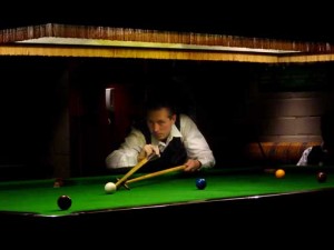 Playing snooker