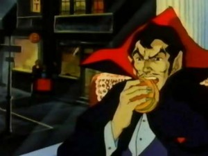 Dracula eating burger