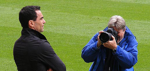 Roberto Martinez is snapped by a photographer