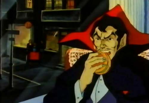 Dracula eating burger